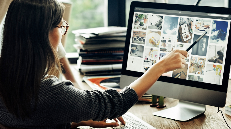 woman checking scalable website in dallas on her computer woman checking scalable website in dallas on her computer