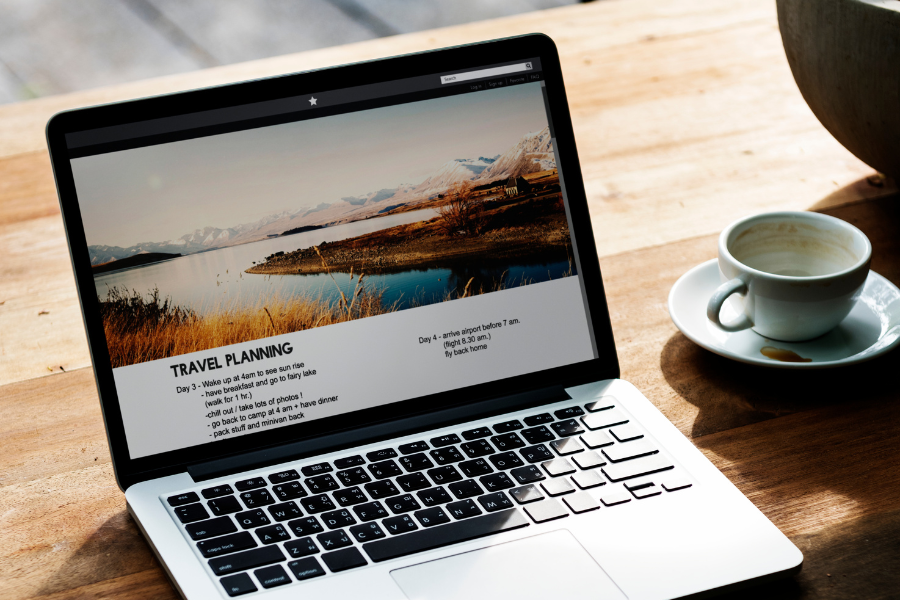 a laptop on a table viewing a website design a laptop on a table viewing a website design