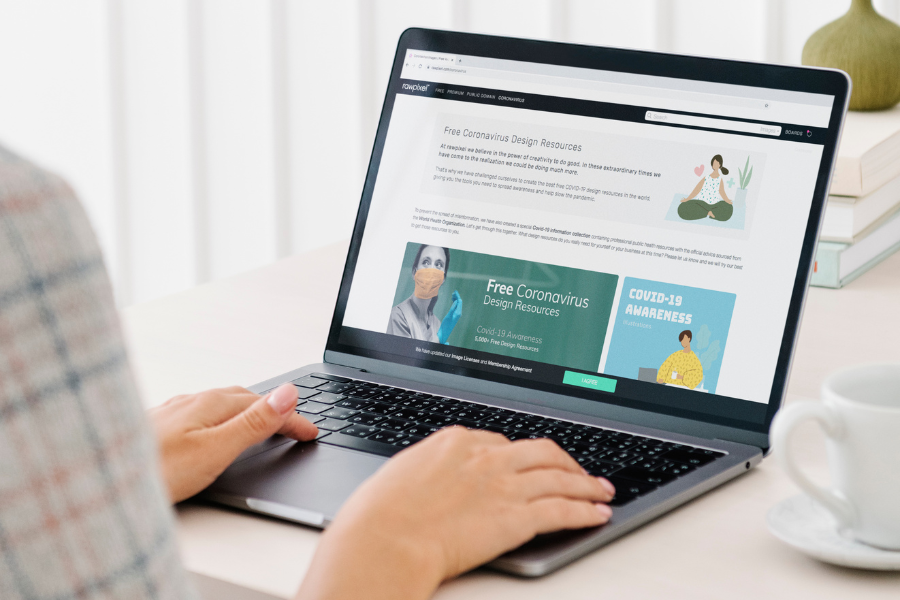 a woman looking for a successful website design for her business a woman looking for a successful website design for her business