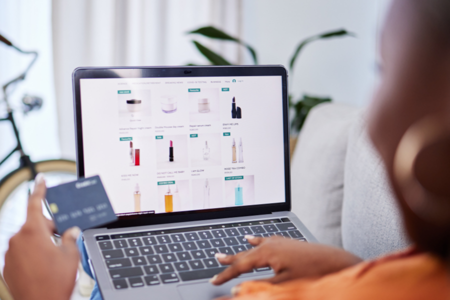 a woman checking on an ecommerce website to shop products a woman checking on an ecommerce website to shop products